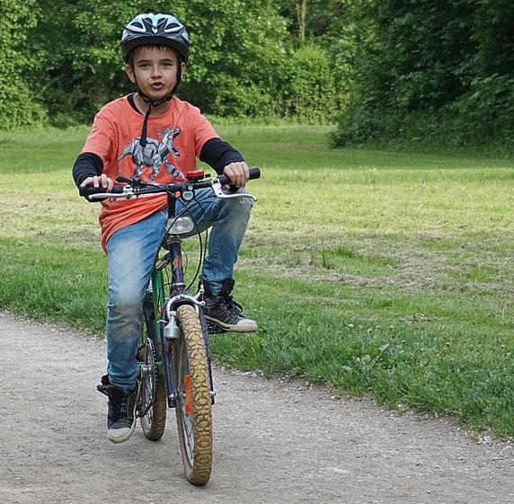 boy in helmet for brain injury prevention