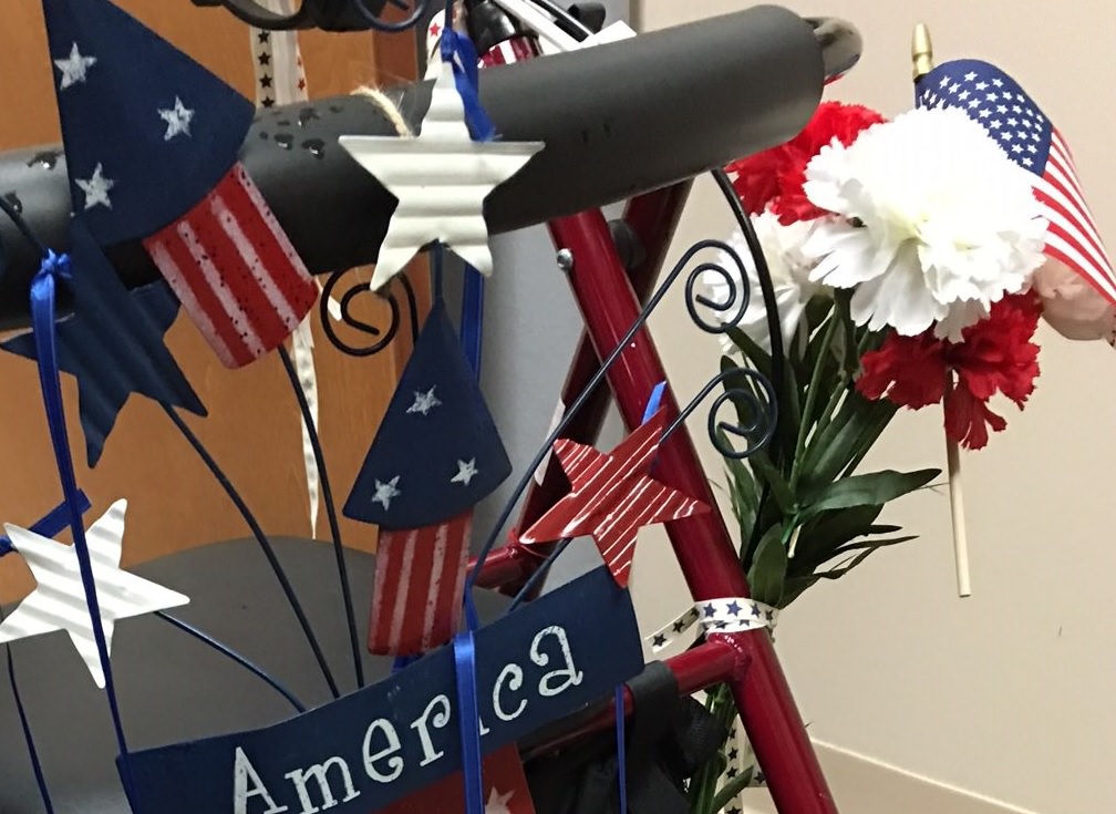 decorating medical walkers example with flags, stars and flowers