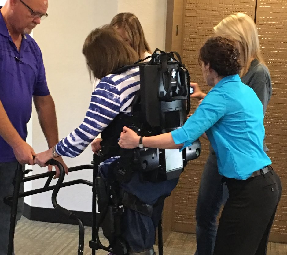 exoskeleton with therapists guiding